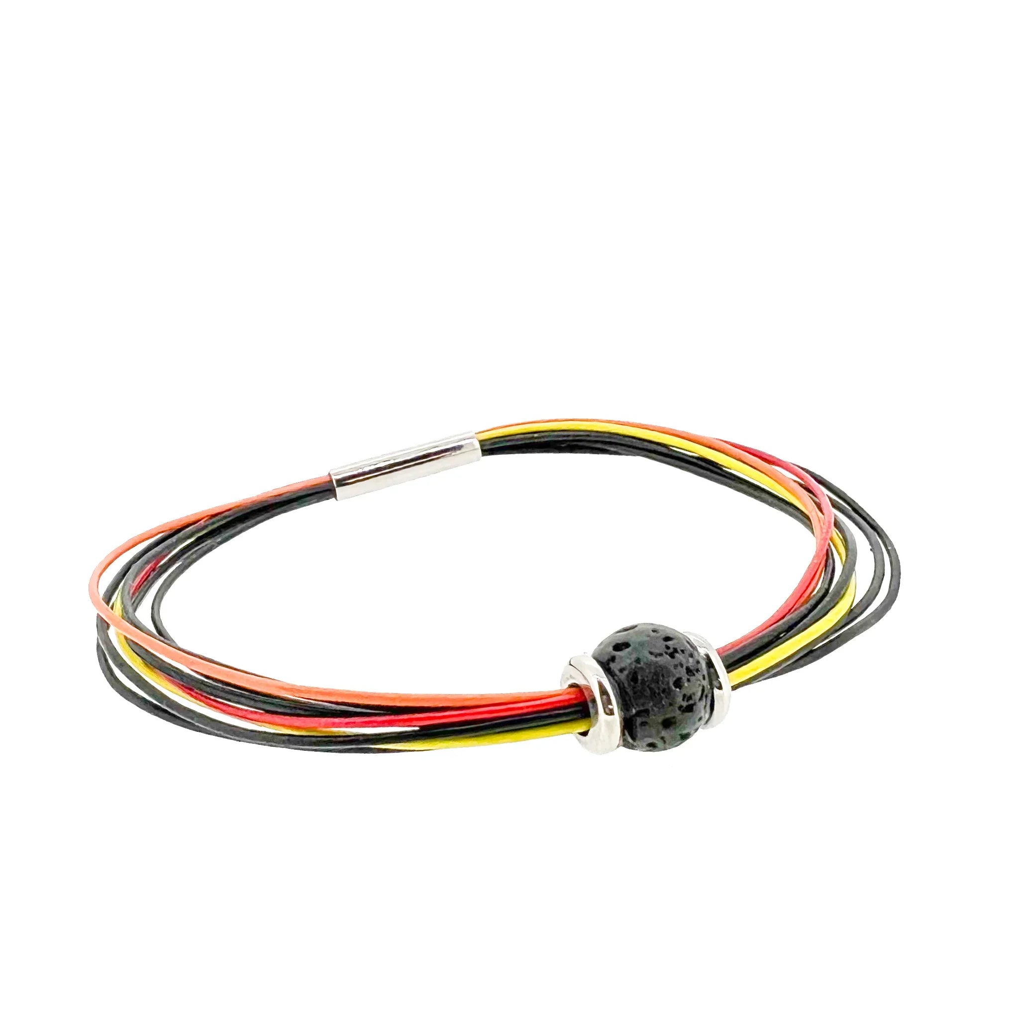 Volcano eruption leather bracelet with lava bead charm has 3.5mm matt titanium magnetic lock. With 8 X 0.5mm premium leather. This colorful leather bracelet is inspired by the volcanic eruptions on the Reykjanes peninsula SW of Iceland. Made by Zeezen The lava bead is easy to remove and you can add to the bracelet any charm for example from Zeezen, Trollbeads and Pandora.